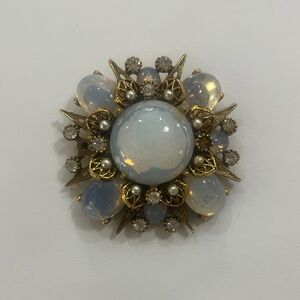 Elegant Gold and White Brooch